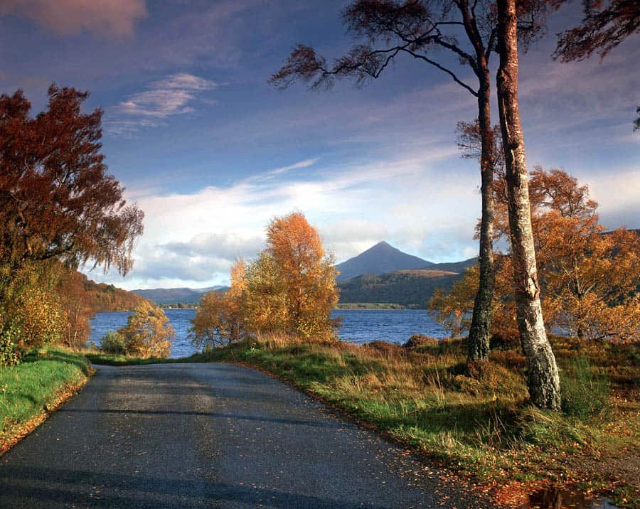 THE CONICAL MOUNTAIN OF SCHIEHALLION FROM THE SMALL ROAD BESIDE LOCH RANNOCH, NEAR KINLOCH RANNOCH, PERTHSHIRE